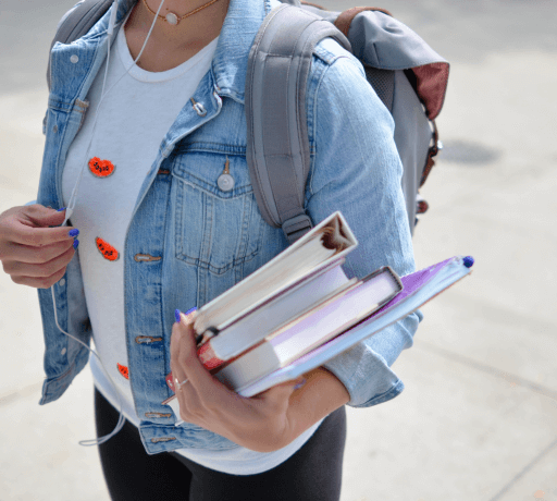 person ready for work holding document stack